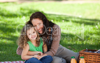 Mother and her daughter picnicking