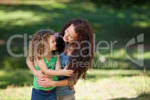 Daughter with her mother in the park