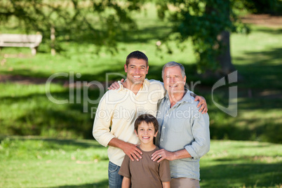 Family looking at the camera in the park