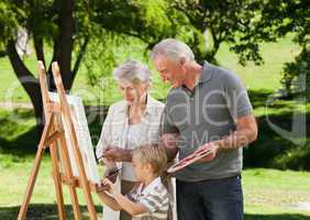 Family painting in the garden