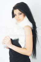 Girl wearing white fur