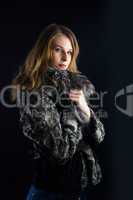 Attractive woman in fur coat