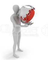 White man holds globe with heart, Asia part