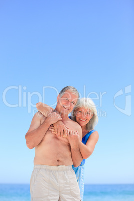 Happy couple on the beach