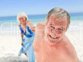 Happy couple on the beach