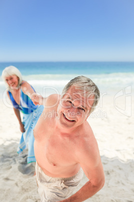 Happy couple on the beach