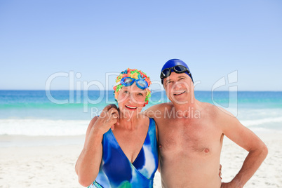 Happy elderly couple on the beach