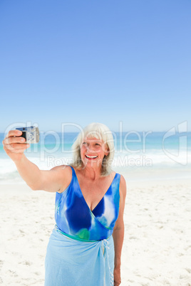 Woman taking a photo of herself