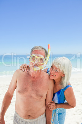 Retired couple on the beach