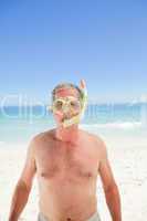 Senior man with his mask and his snorkel