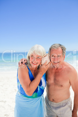 Retired couple on the beach