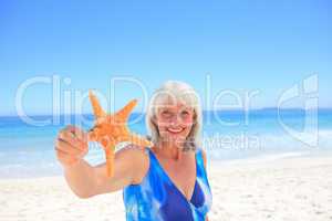 Elderly woman with her star sea