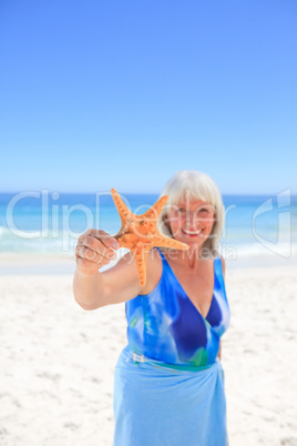 Elderly woman with her star sea