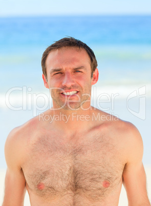 Handsome man on the beach