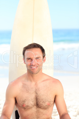 Man with his surfboard