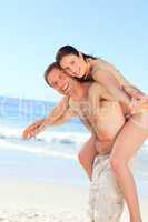 Man with his wife on the beach