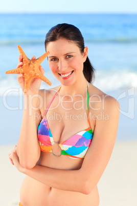 Pretty woman with a starfish