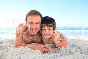 Father and his son at the beach