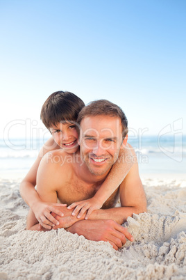 Father and his son at the beach