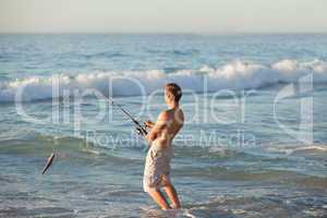 Active man fishing