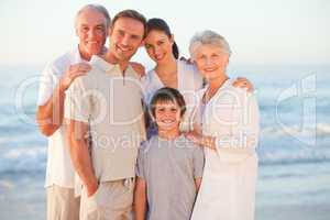 Portrait of a smiling family at the beach