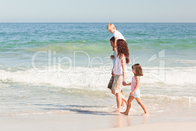 Joyful family at the beach