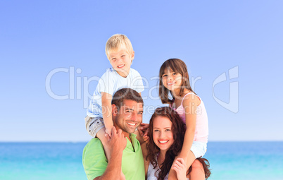 Happy children playing with their parents