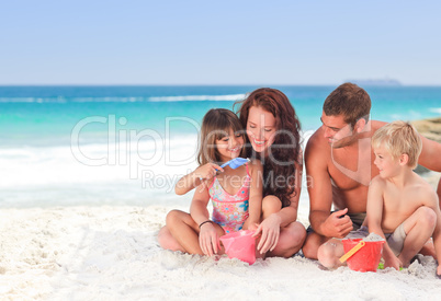 Portrait of a family at the beach