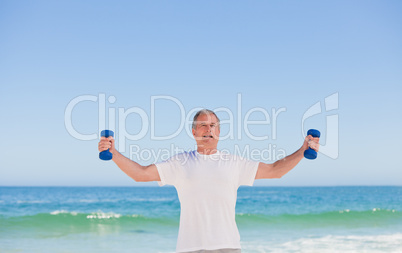 Elderly man doing his exercises