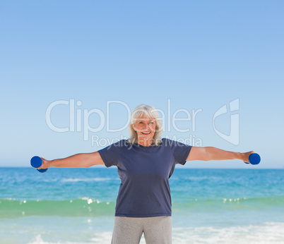 Mature woman doing her exercises