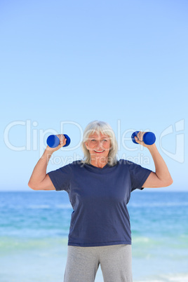 Mature woman doing her exercises