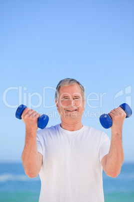 Mature man doing his exercises