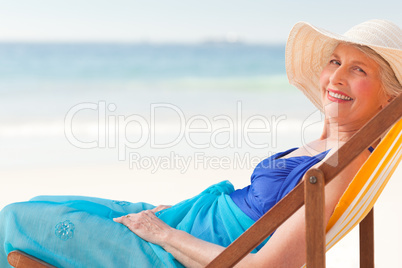 Relaxed woman at the beach