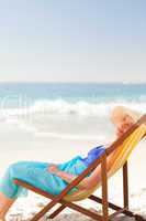Relaxed woman at the beach