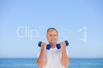 Mature man doing his exercises