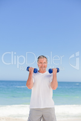 Mature man doing his exercises