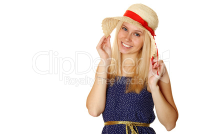 Beautiful young blond woman in a straw hat