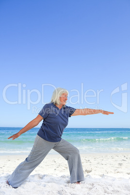 Retired woman doing her stretches
