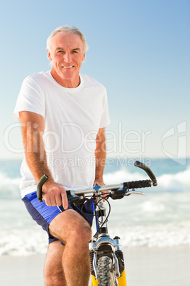 Senior man with his bike