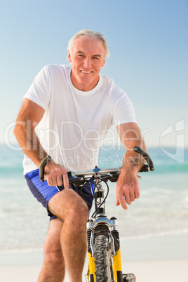 Senior man with his bike