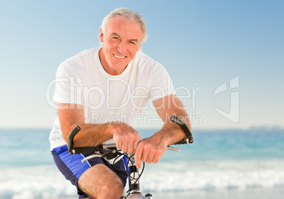 Senior man with his bike