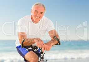 Senior man with his bike