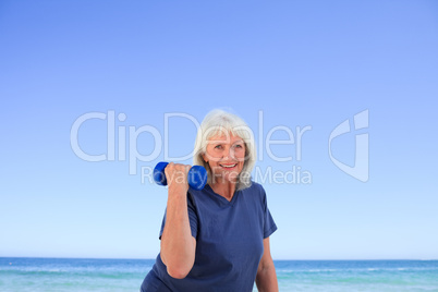 Mature woman doing her exercises