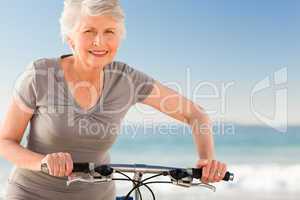 Senior woman with her bike