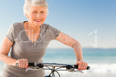 Senior woman with her bike