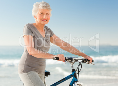 Senior woman with her bike