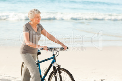 Senior woman with her bike