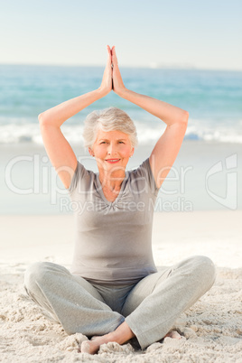 Elderly woman doing her streches