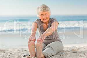 Elderly woman doing her streches