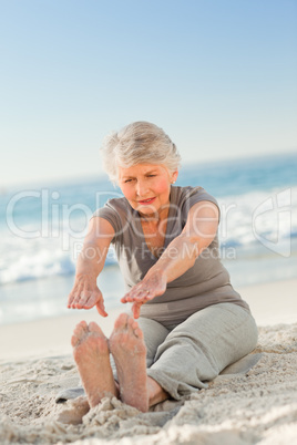 Elderly woman doing her streches